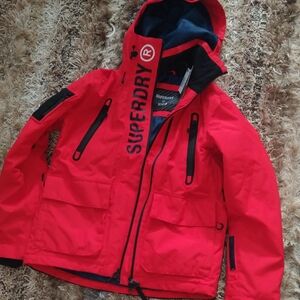 New SuperDry Deep Red Ski/Snowboard/Winter Jacket W/ Black Rear Panel & Recco M